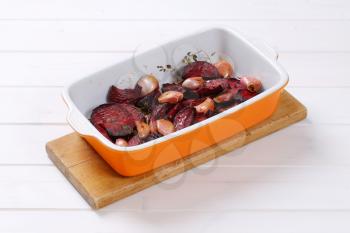 freshly baked beetroot with garlic in baking dish