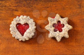 shortbread cookies with jam filling
 on wooden background