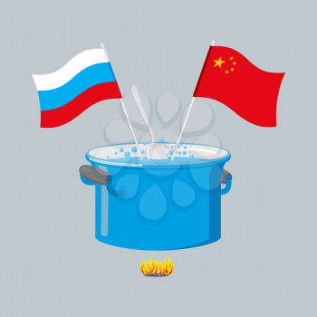 Political kitchen. Russia and China community. Cook soup in one pot. Russian flag and Chinese flag
