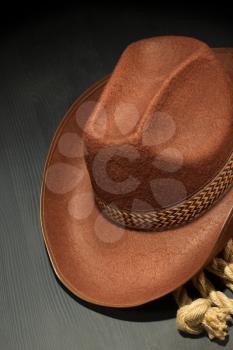 cowboy hat on wooden background