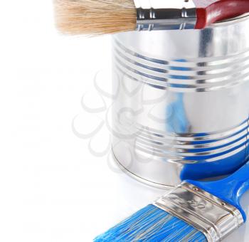 blue paint brush and metal bucket isolated on white background