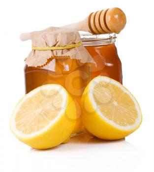 two sliced lemon andd honey