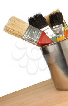 paint bucket and brush isolated on white background