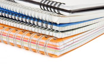 pile of checked notebook isolated on white background