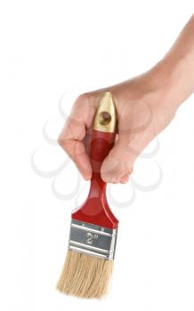 male hand and brush red isolated on white background