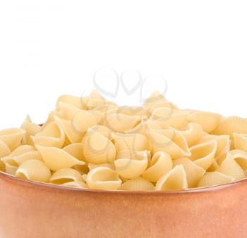 raw pasta and plate isolated on white background
