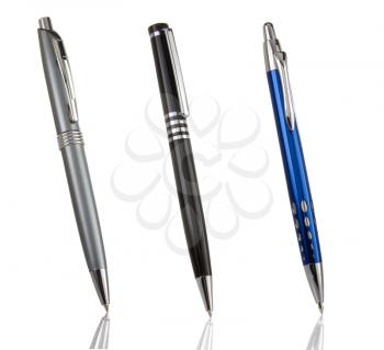 black, blue and silver shining pens isolated on white background