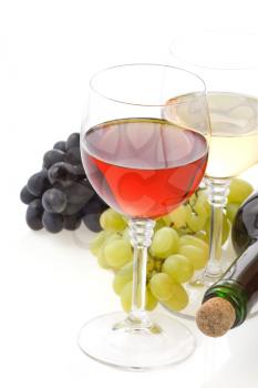 wine in glass and grape isolated on white background