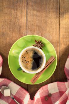 cup of  coffee on wooden background