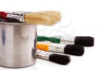 paint buckets, paint and brush isolated on white background