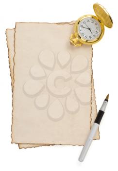 ink pen and watch at parchment isolated on white background