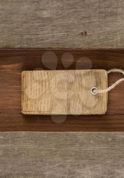 price tag over wooden background
