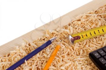 tape measure and wood sawdust products