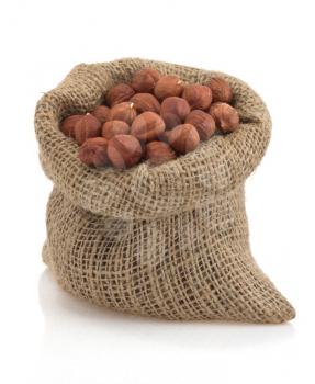 nuts hazelnut in bag  isolated on white background