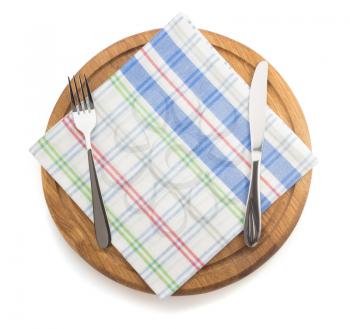 kitchen utensils at cutting board on white background