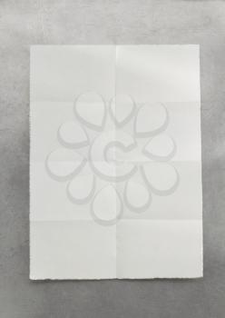 folded note paper at metal background