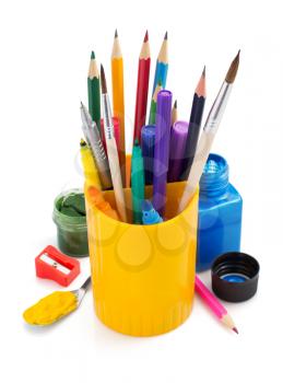 paint supplies and holder basket on white background