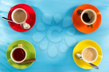 cup of coffee and tea on wooden background