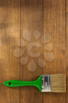 paint brush on wooden background