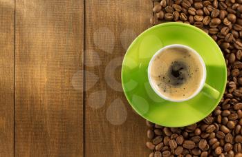 cup of  coffee on wooden background