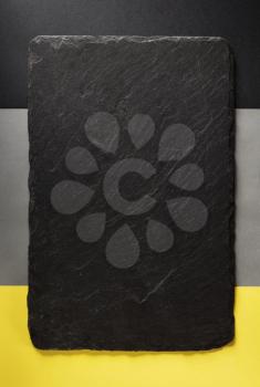 black slate texture at colorful background