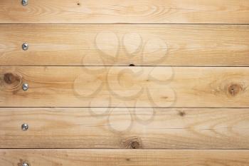 wooden background as texture surface with screws, top view