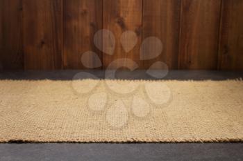 burlap hessian sacking cloth on wooden background table in front view