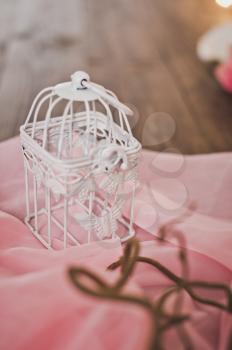 Bird cages with decorations.