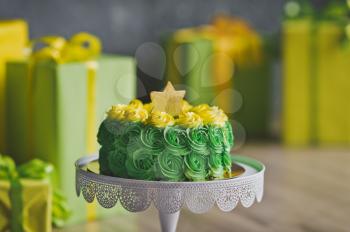 Beautiful yellow and green decorated cake for your birthday.