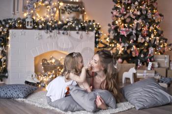 Christmas family photo shoot of mom and daughter.