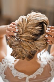 Wedding hairstyle of a beautiful girl close-up.