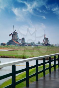 Traditional Dutch windmills with canal near the Amsterdam, Holland