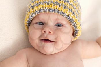 3 months baby girl in cap portrait