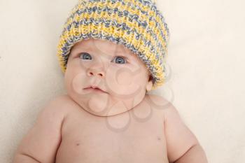 3 months baby girl in cap portrait