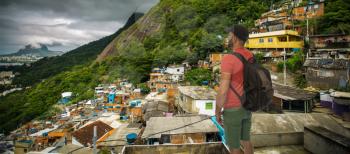a man travels through Favela to RIO. Brazil.