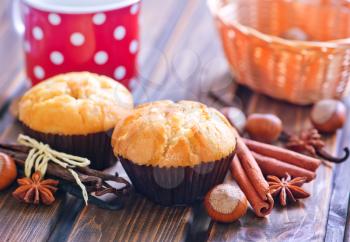 sweet muffins with cinnamon and anis on a table