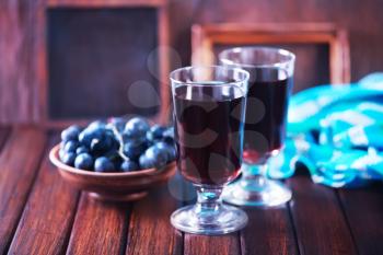 grape wine in glass and on a table