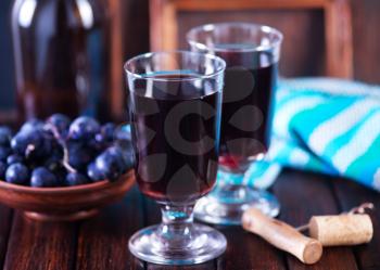 grape wine in glass and on a table