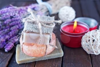 handmade soaps on the wooden table, spa objects