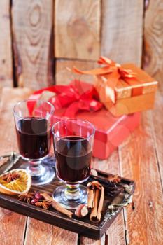 mulled wine with spice on a table