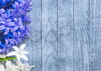 flowers on the wooden table, spring background