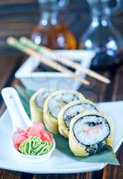 sushi on plate and on a table