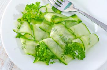 fresh salad with cucumbers on the plate