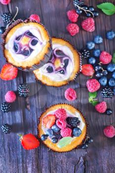 cake with fresh berries on a table