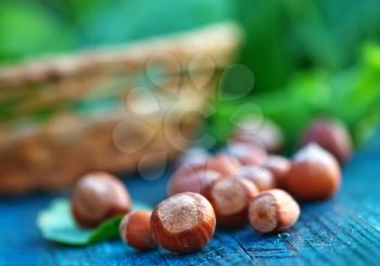 nuts on the wooden table, fresh hazelnuts