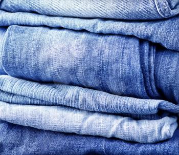 stack of jeans on the white plate
