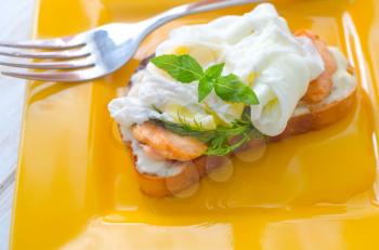 Close Up of Poached Delicious Egg with Whole Grain Bread