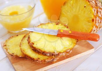 pineapple on board and on a table