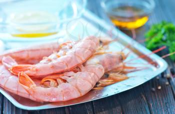 portion of big shrimps with salt and spice