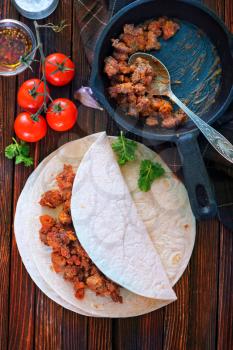 ingredients for taco, minced meat and dough